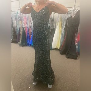 Jovani designer gown- only worn once.  Designer dresses run small.